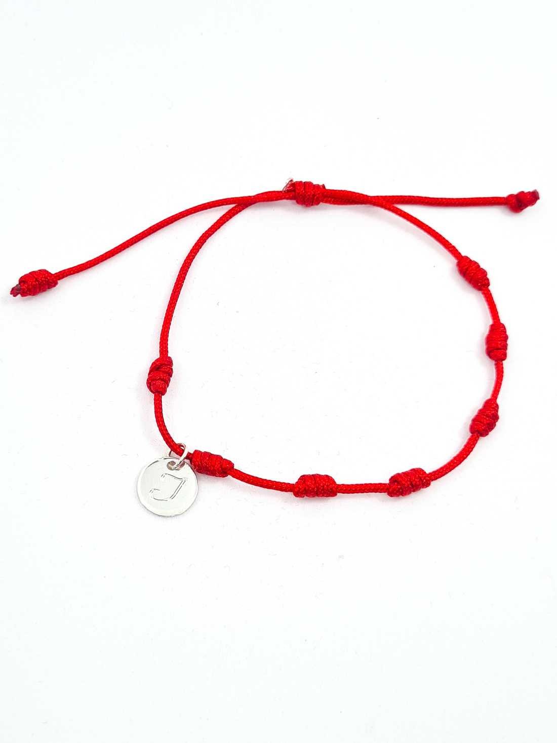 PULSEIRA TEXTIL 7 NÓS COM VERMELHA OU PRETA MEDALHA PRATA LEI  