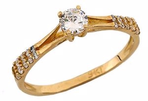 ANEL SOLITÁRIO COM ZIRCONIAS  9KANA044 OURO 9K ZERUS