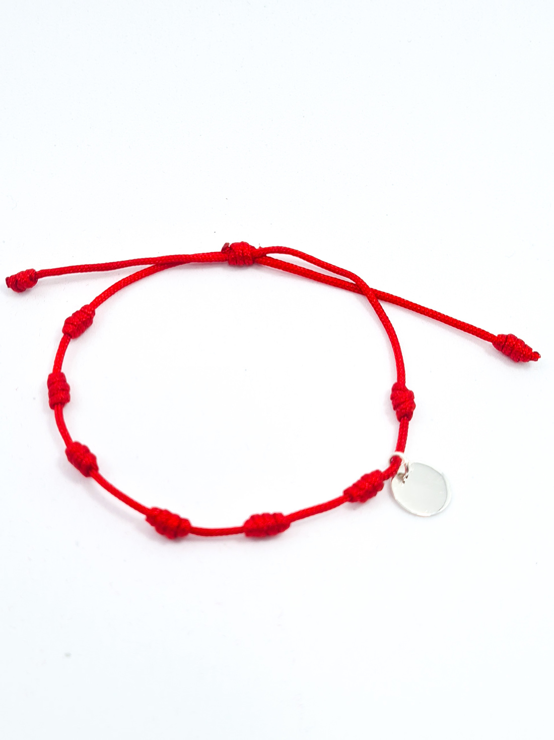 PULSEIRA TEXTIL 7 NÓS COM VERMELHA OU PRETA MEDALHA PRATA LEI  